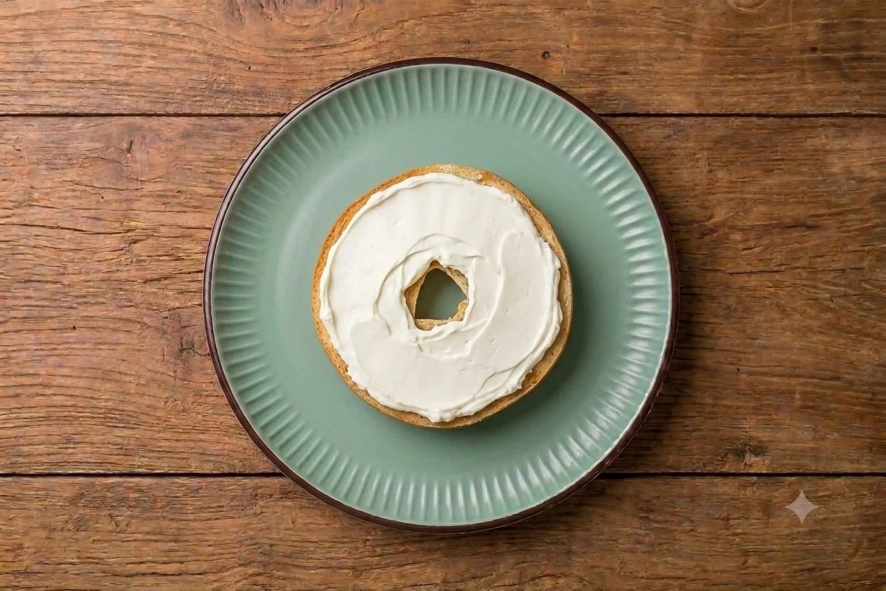 Bagel with a cream cheese spread at KYP